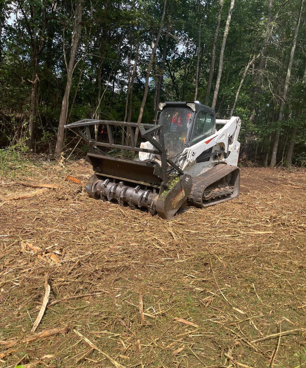 forestry mulcher working on a job site